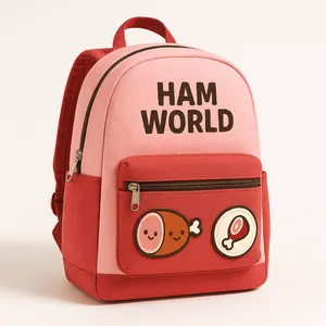 Pink and red backpack with Ham World logo and ham-themed patches