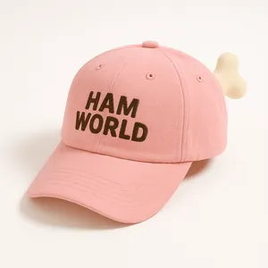 Baseball cap designed to look like a ham with Ham World logo